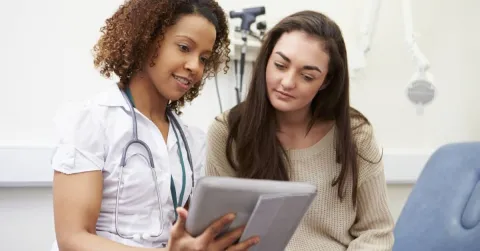 Female nurse practitioner demonstrating communication skills